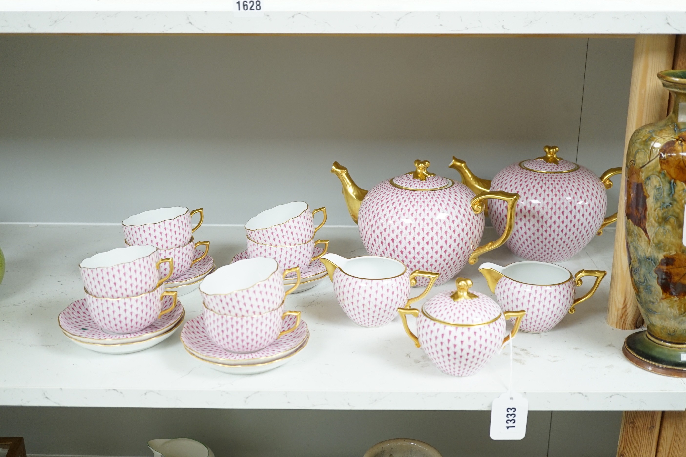 A Herend red scale pattern part tea set including two large teapots